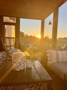 Sunrise coming through screened porch